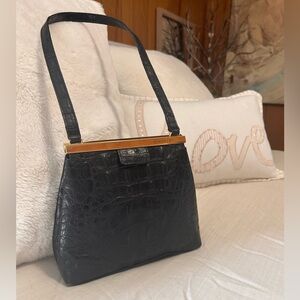 This is a Vintage LaMarthe Handbag crocodile/Alligator Leather mid 20th Century